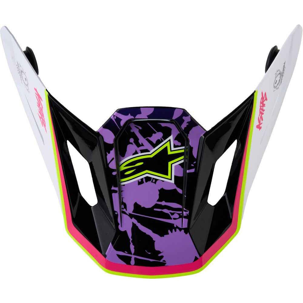 Alpinestars motocross helmet visor featuring a purple and black camouflage pattern with neon pink, lime green, and white accents.