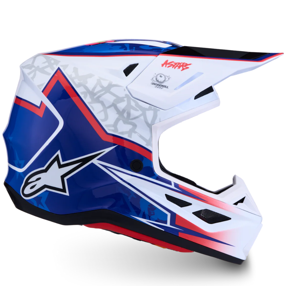 A full-face motocross helmet by Alpinestars in a blue, white, and red color scheme, shown from a three-quarters angle on a white background.