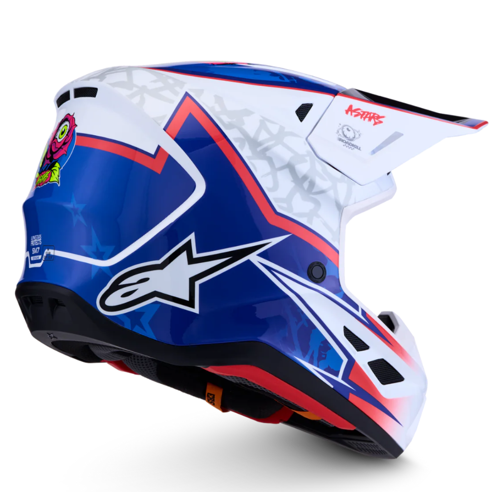 A Alpinestars brand motocross helmet in a white, blue, and red color scheme with Alpinestars logo, shown on a clean white background.