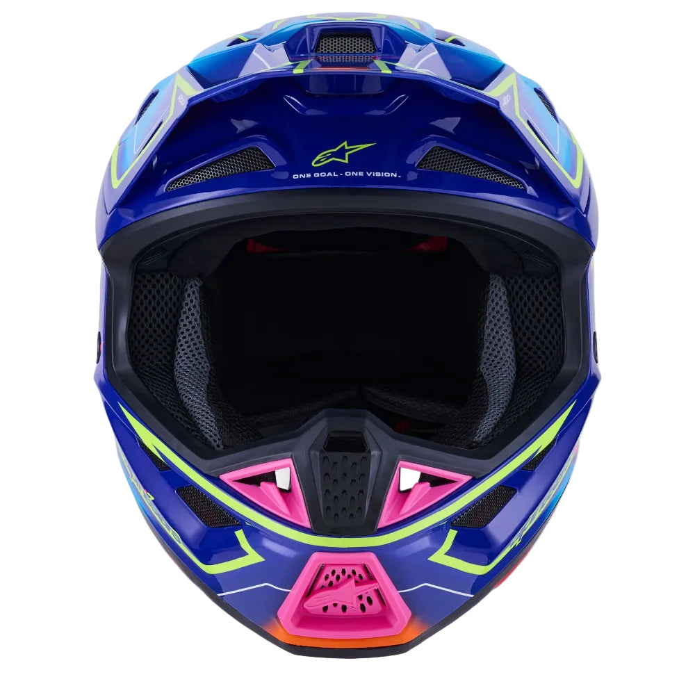 Blue Alpinestars full-face motocross helmet with neon lime green and hot pink graphic accents, shown from a front-facing perspective on a white background.