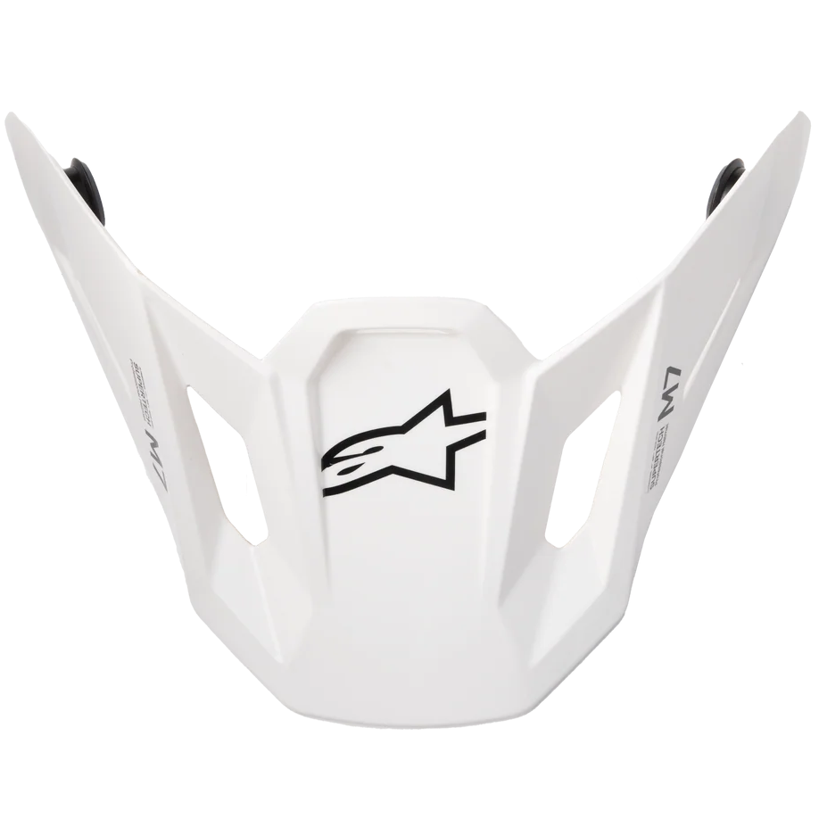 White Alpinestars motocross helmet face shield with a black logo on the front, displayed against a solid white background.