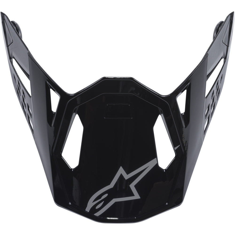 Black motorcycle helmet visor with a star logo on a white background