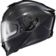 Carbon fiber motorcycle helmet with clear visor on a white background
