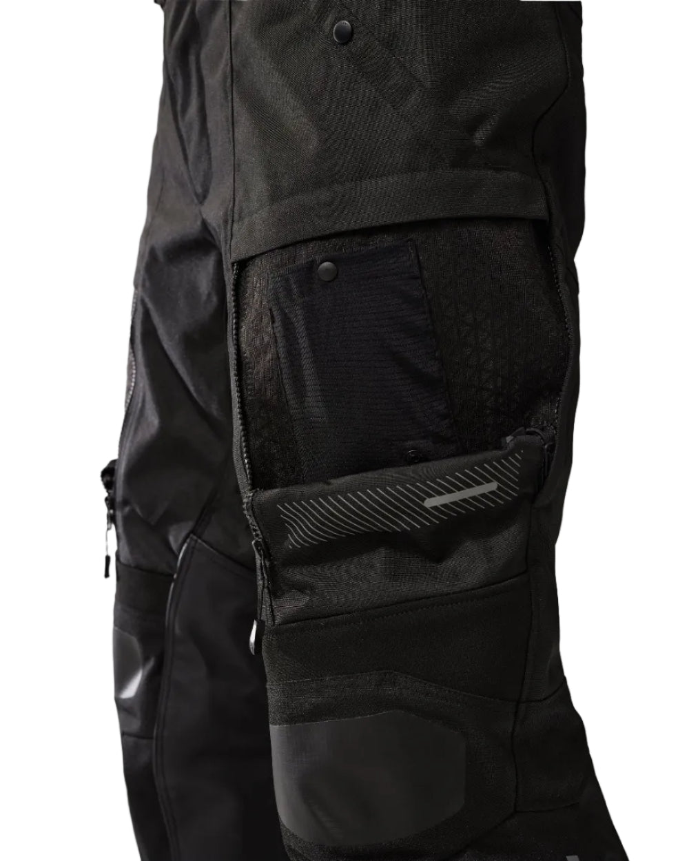 Close-up of a black jacket with zippers and buttons on a light gray background