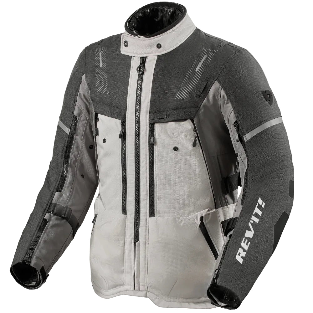 Gray and black motorcycle jacket with REV'IT branding on a white background
