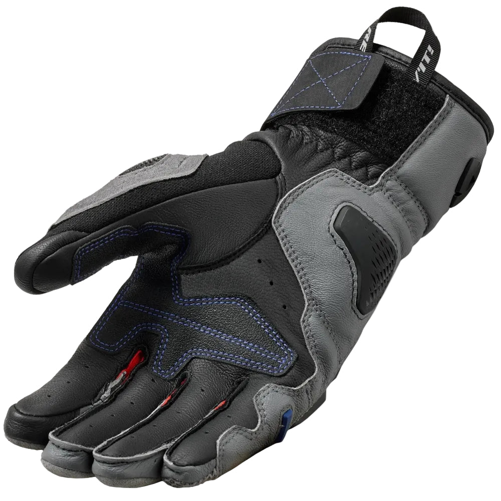 Black and gray glove on a light gray background