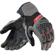 Pair of gray and black gloves with red accents on a white background