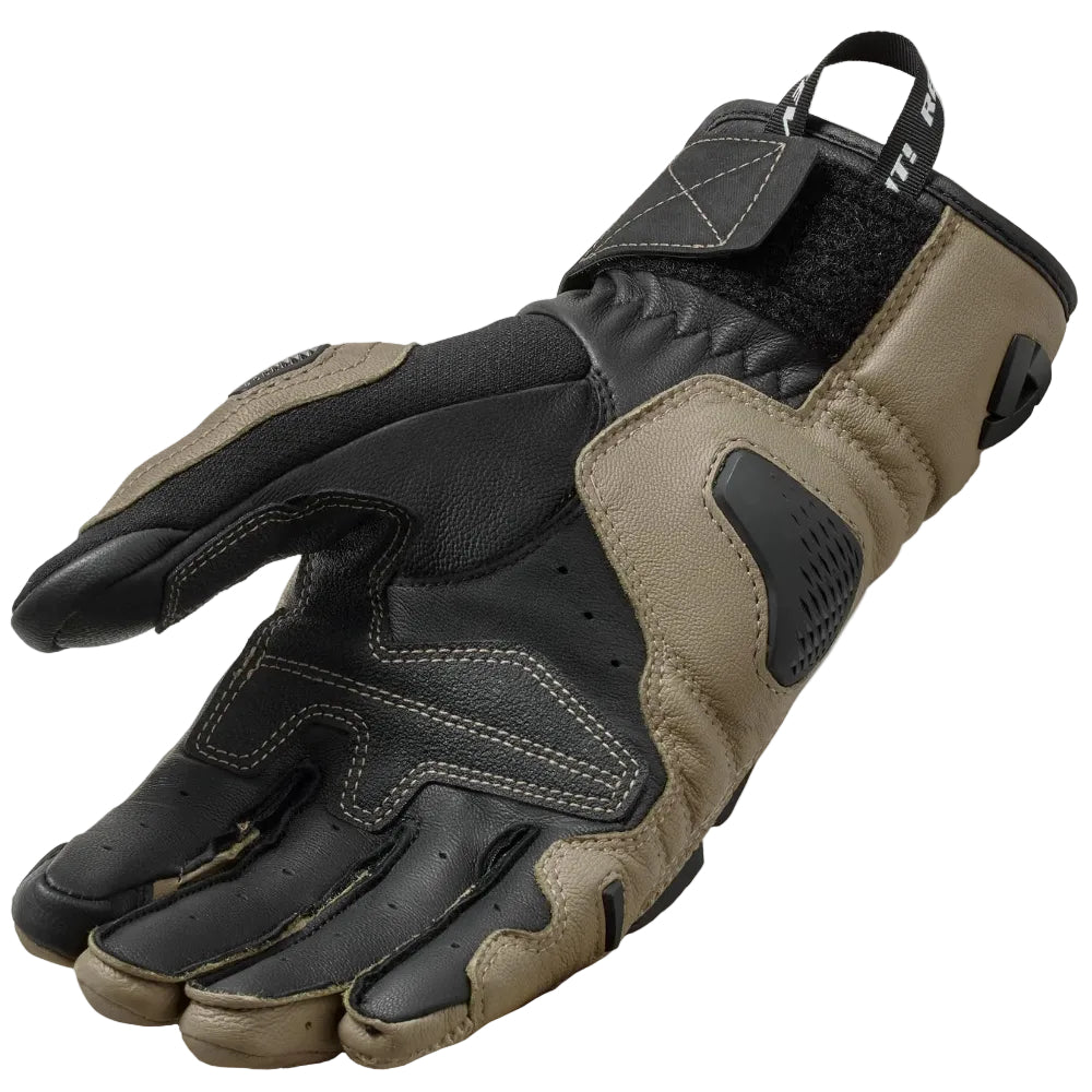 Camouflage glove on a light gray background