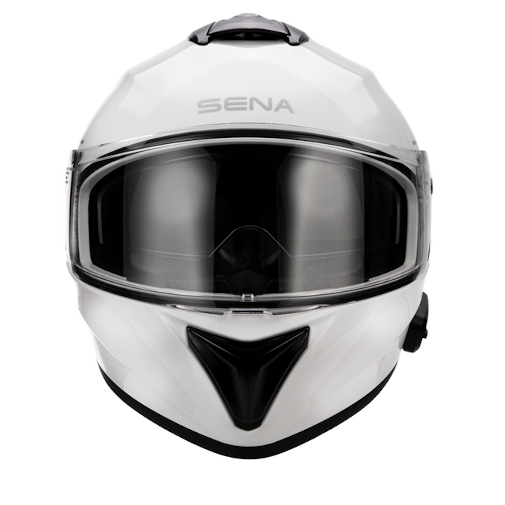 A white full-face motorcycle helmet with a dark tinted visor and black trim, featuring the brand name 'SENA' on the forehead, set against a plain white background.