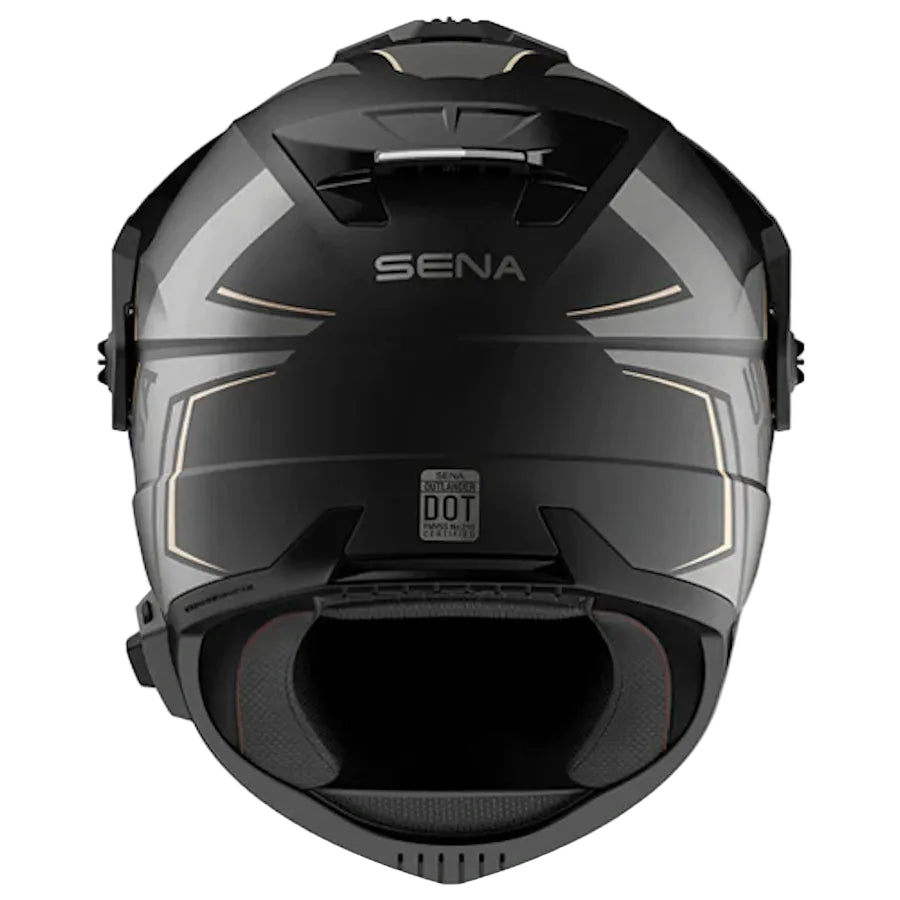Black SENA full-face motorcycle helmet with subtle gold accent lines and a visible DOT 2026 certification sticker on the lower front.