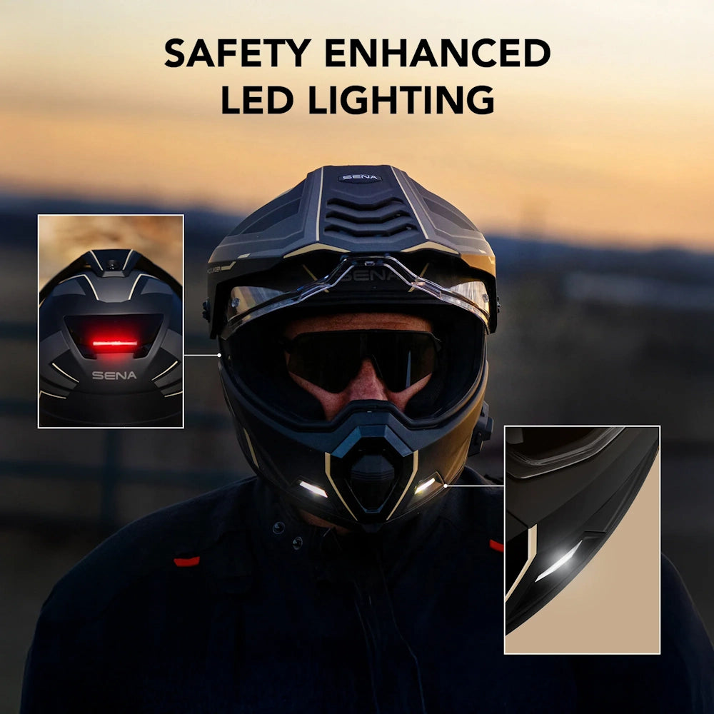 A person wearing a black SENR motorcycle helmet with integrated LED lights, shown outdoors at sunset with two inset detail views highlighting the rear red LED light and front LED illumination. Text at the top reads 'SAFETY ENHANCED LED LIGHTING'.