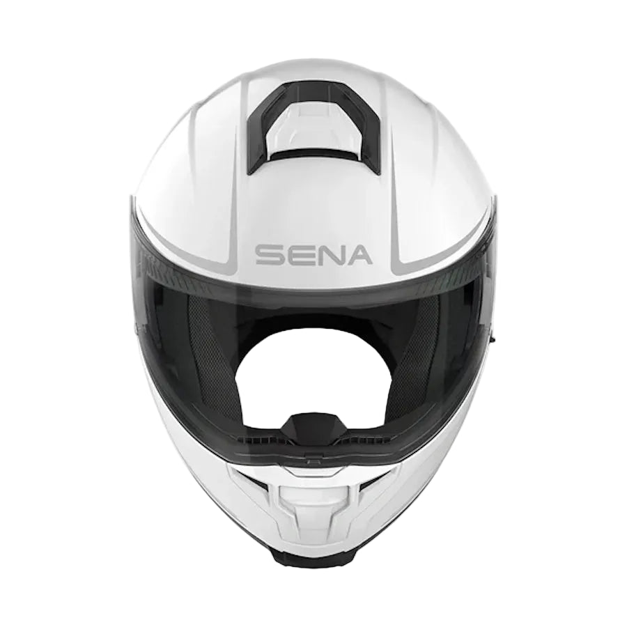 A white full-face motorcycle helmet with a dark visor and the brand name 'SENA' printed on the forehead, shown against a light gray background.