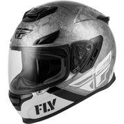 A Fly brand full-face motorcycle helmet featuring a gray and white graphic pattern with black accents, a clear visor, and the Fly logo on the forehead and lower chin area.