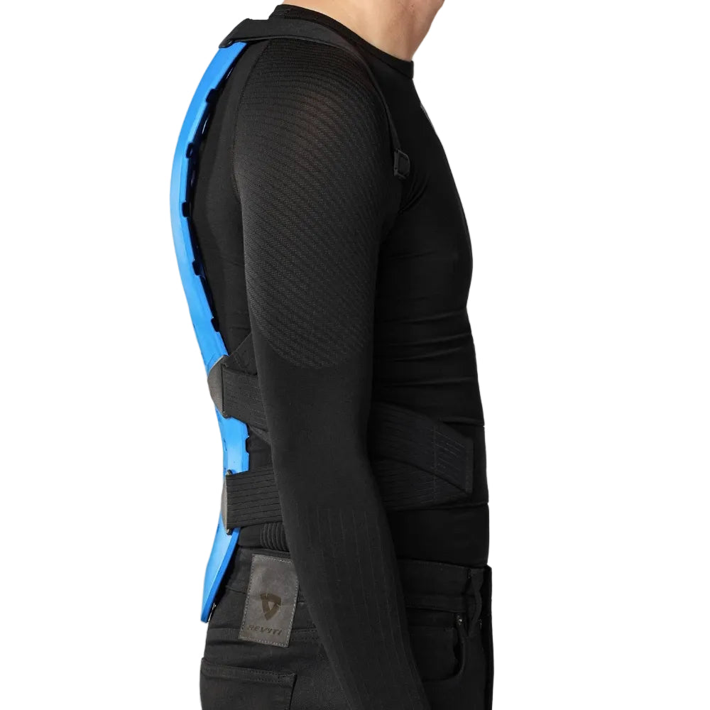 Person wearing a black long-sleeve shirt with a blue and gray back panel on a white background