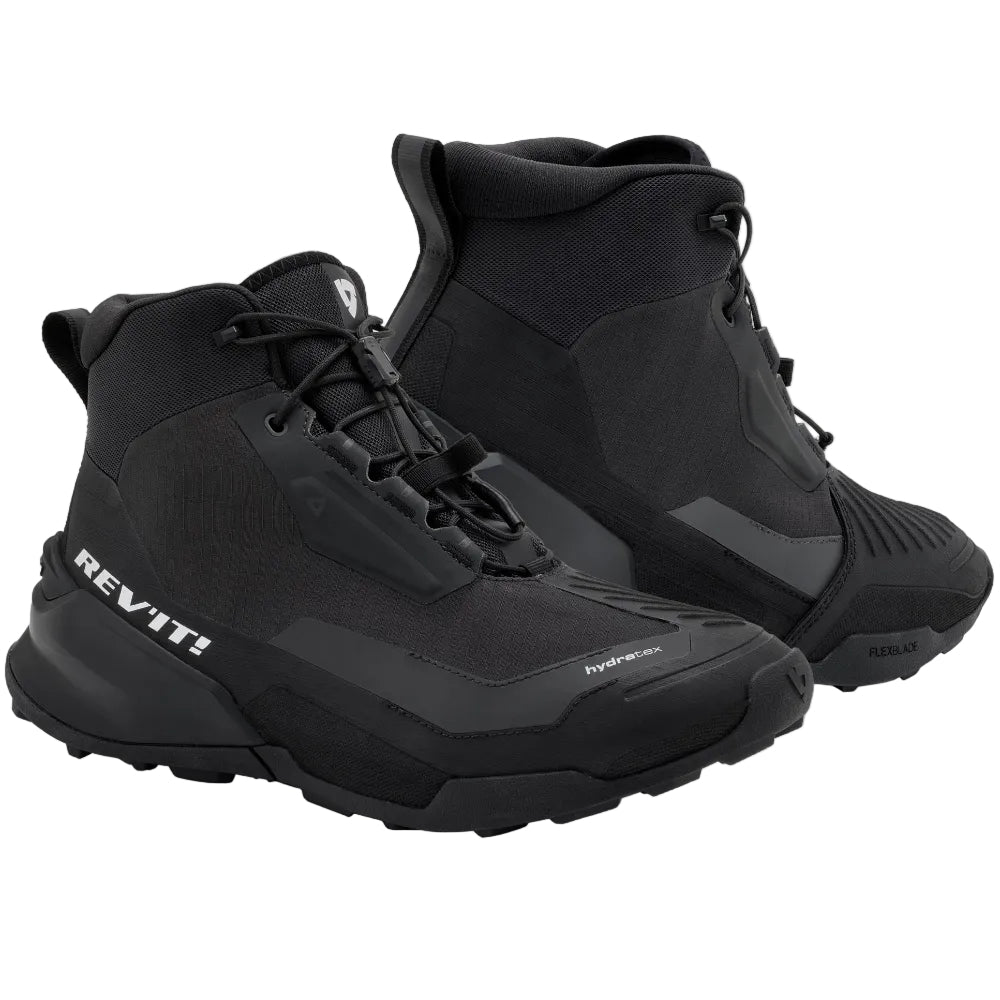 Black high-top sneakers with 'Rev'it' branding on a light gray background