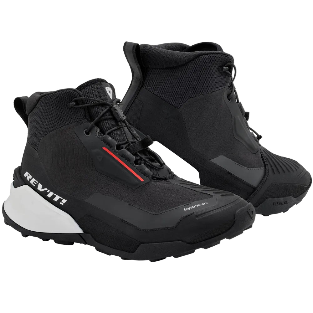 Black high-top sneakers with a visible brand logo on a light gray background