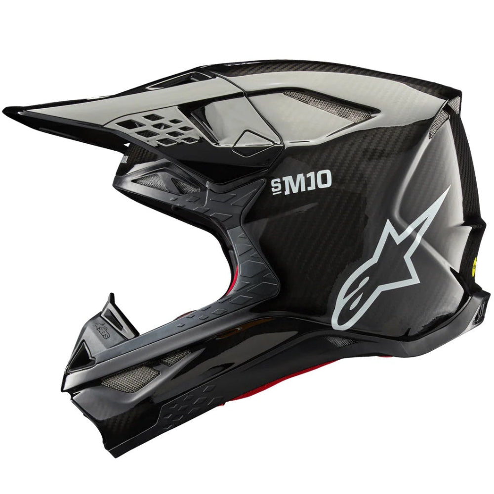 Black and gray motocross helmet with 'Alpinestars' logo on a white background