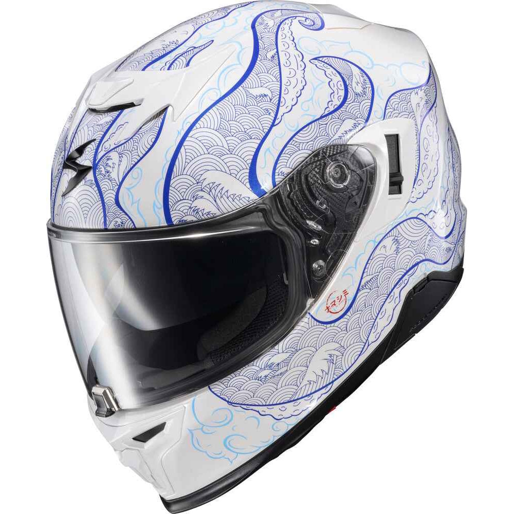 A white full-face motorcycle helmet with a blue wave pattern, featuring a clear visor and black trim, shown against a plain white background.