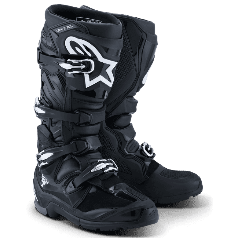 A pair of Alpinestars motocross boots in a Black/Anthracite/White colorway, featuring the signature white Alpinestars star logo on the side, set against a clean white background.