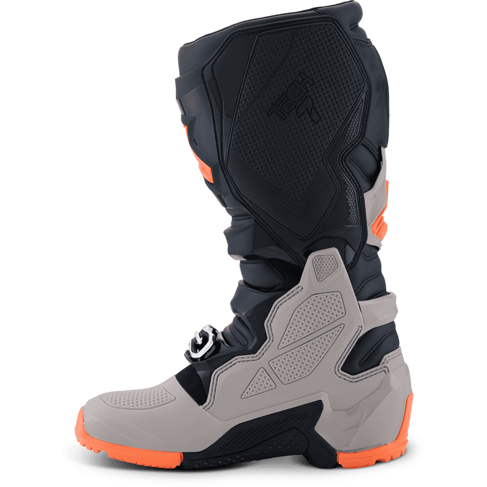 Alpinestars motocross boot in black, gray, and bright orange, shown from the side on a white background.