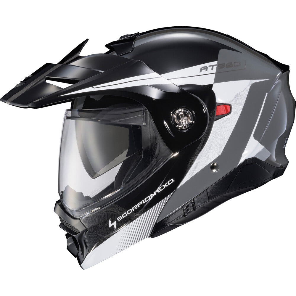 A Scorpion Exo AT960 modular full-face motorcycle helmet in black, white, and gray, featuring a clear visor and an open flip-up hood, shown against a plain white background.