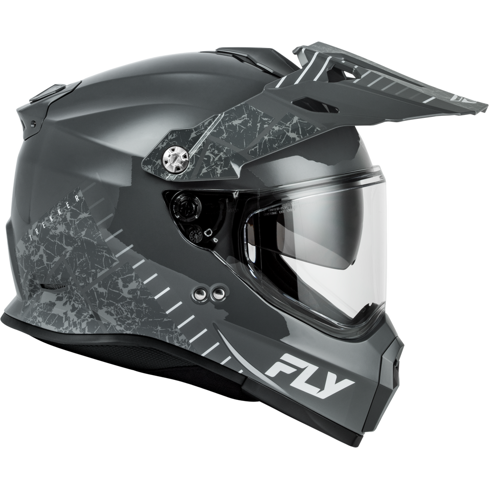 A dark gray Dual Sport motorcycle helmet with a cracked-glass pattern on the sides, a clear visor, and a white 'FLY' logo on the lower front, shown against a plain white background.