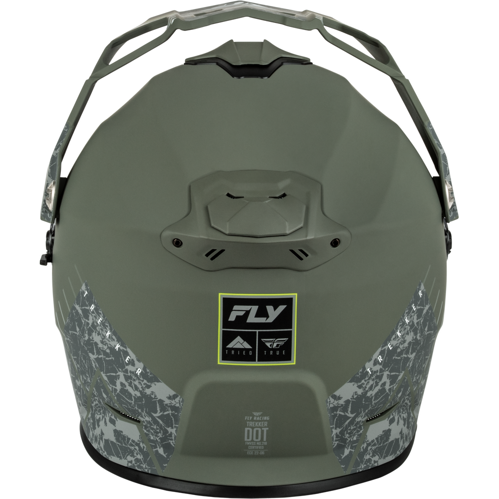 An olive green off-road motocross helmet with a black and gray cracked pattern on the lower sides, featuring a central FLY brand patch and a black chin bar, shown against a plain white background.