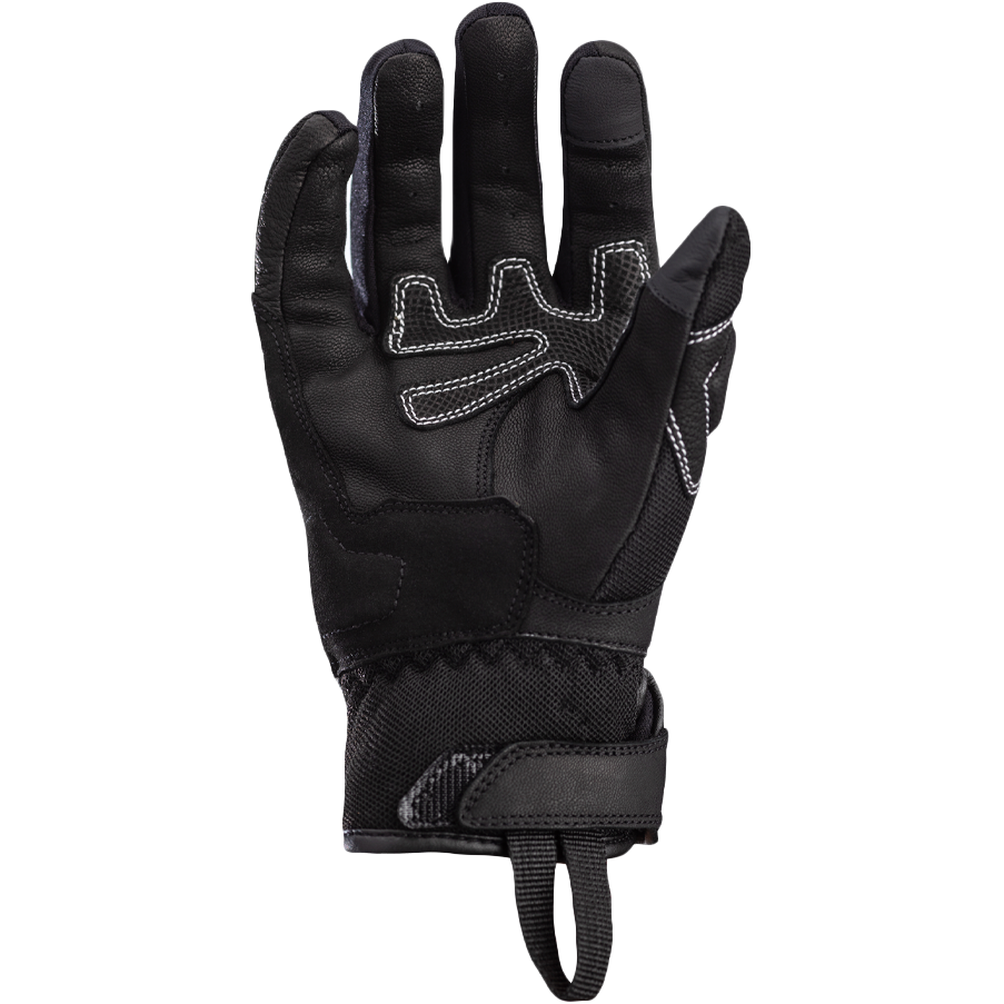 Black tactical glove on a white background