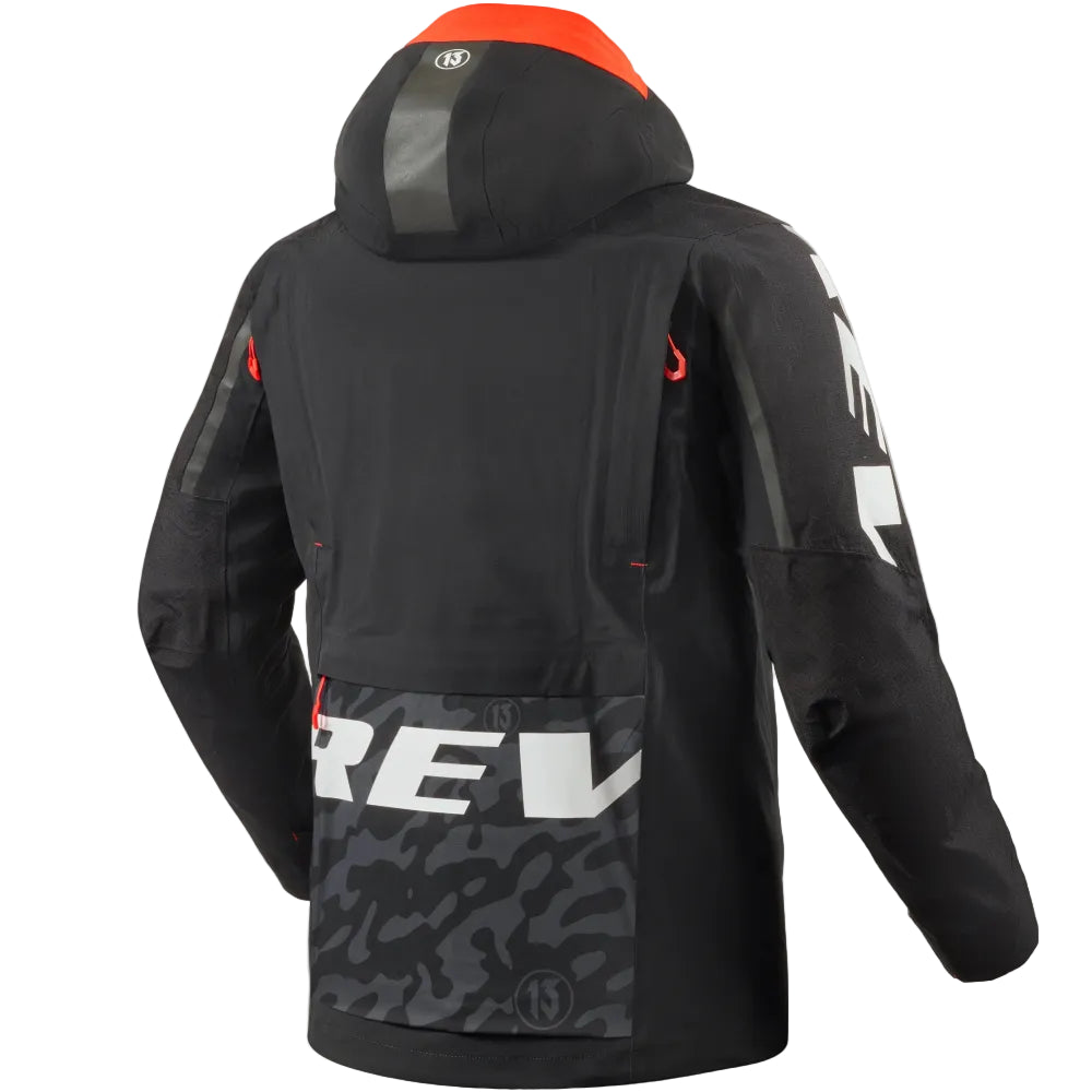 Black jacket with camouflage pocket and visible branding on a light gray background