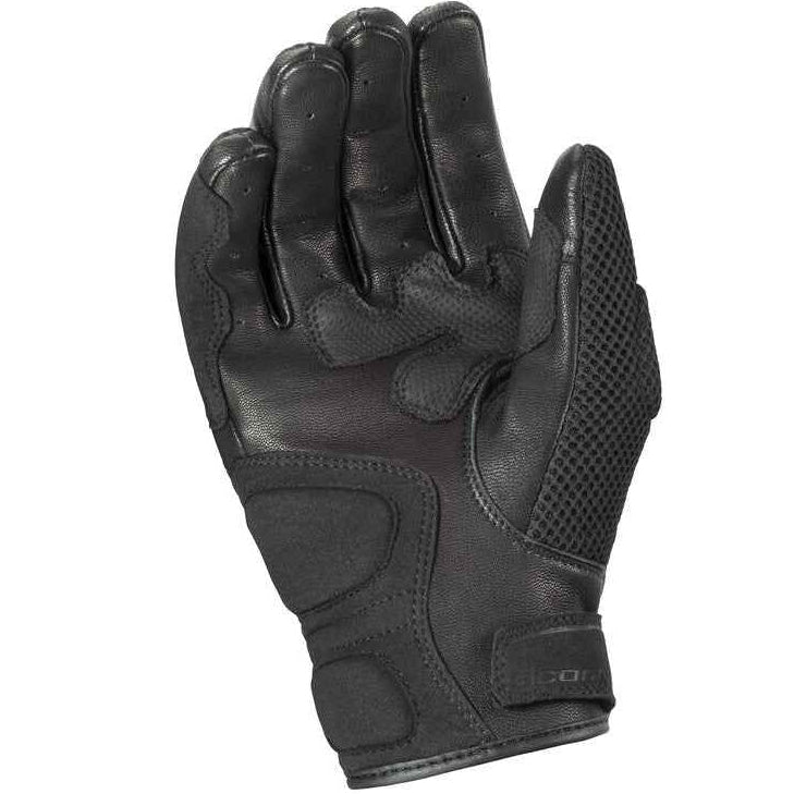Black tactical glove on a white background