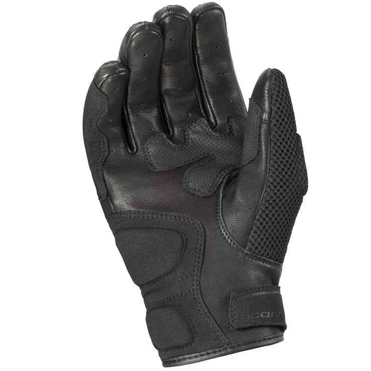 Black tactical glove on a white background