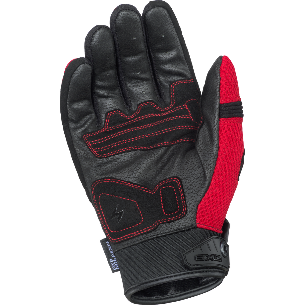 Black and red glove with visible branding on a white background