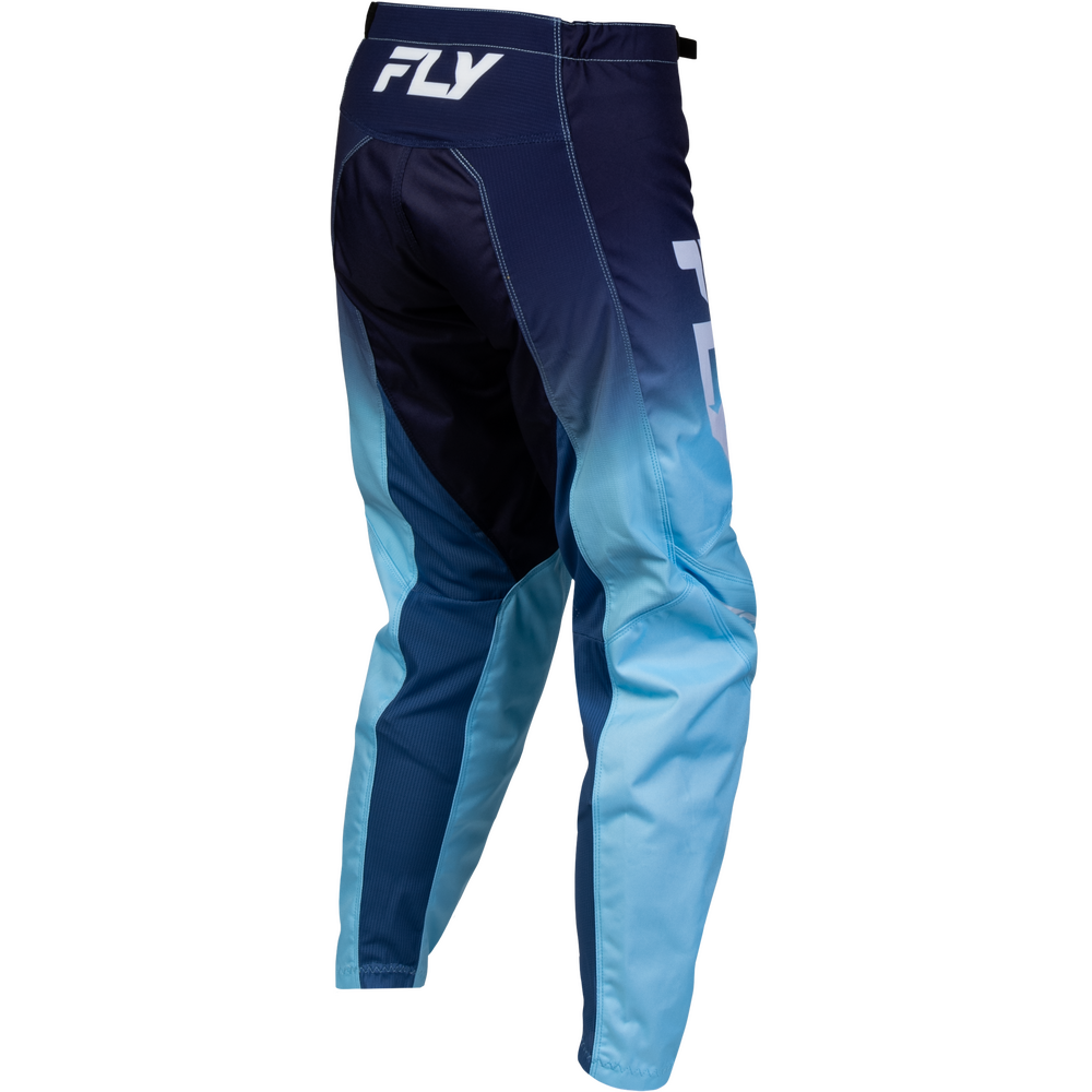 A pair of motocross pants with a dark navy blue to light blue gradient, featuring a white 'FLY' logo on the back waistband and a large white number 7 on the side.
