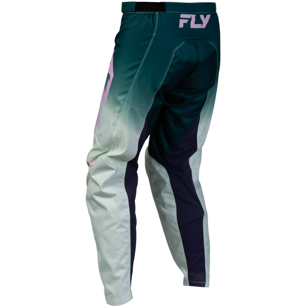 A pair of motocross pants with a dark teal and white gradient, featuring dark navy side panels and pink accents, including the 'FLY' brand logo on the back waistband.