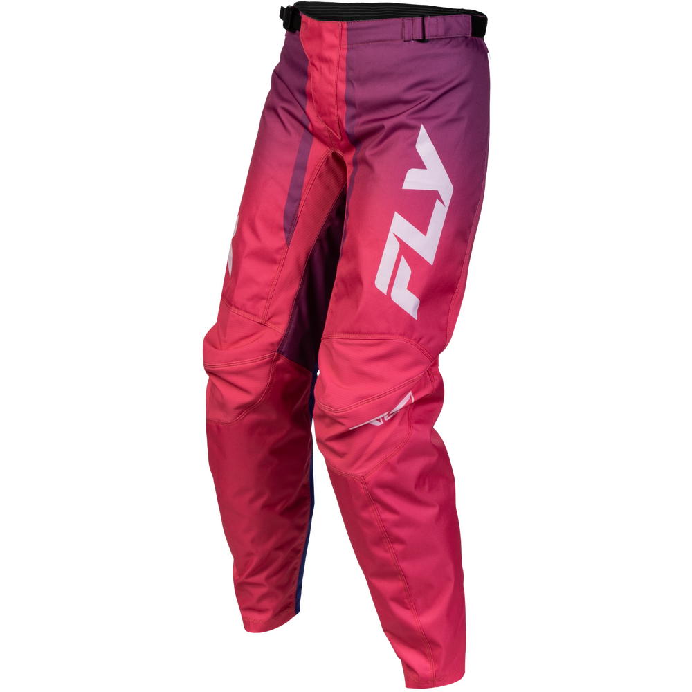 A pair of Fly brand motocross pants in a vibrant magenta-to-purple gradient, featuring a large white 'FLY' logo on the right thigh and a black waistband, shown against a plain white background.