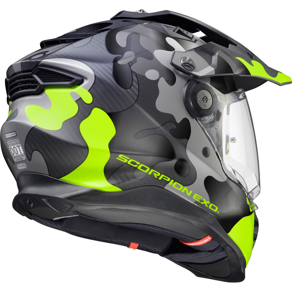 Scorpion EXO motorcycle helmet with camouflage design and green accents on a white background