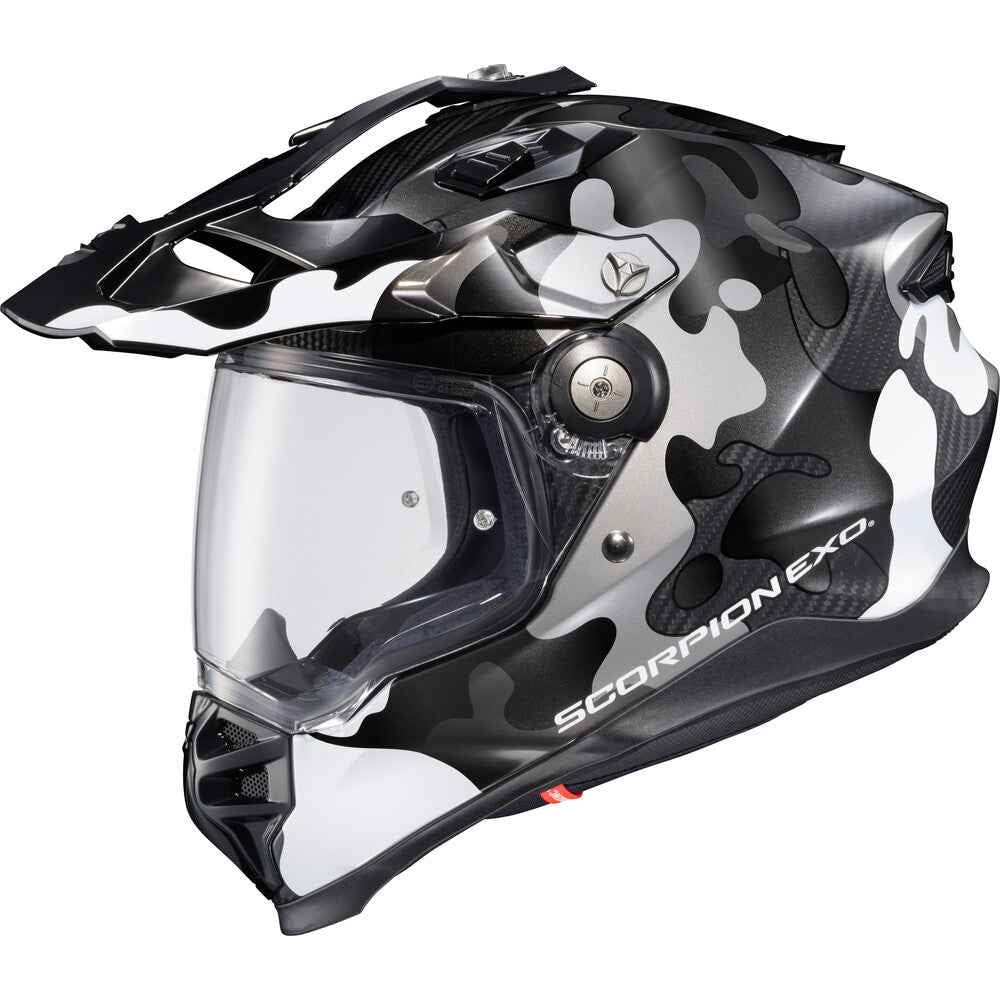 Black and white camouflage motorcycle helmet with visor on a white background