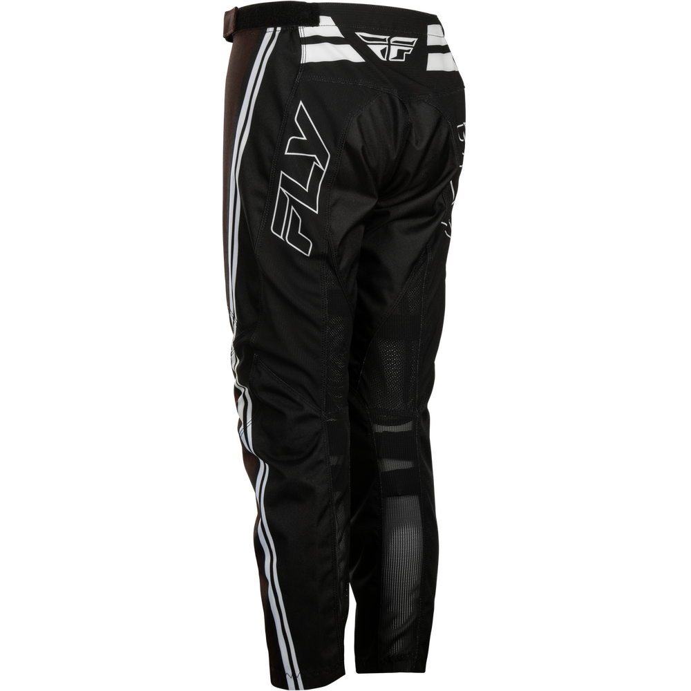 Black Fly Racing motocross pants with white side stripes, a white Fly logo on the side, and a white Fly logo on the back waistband, shown from a three-quarters back angle on a white background.