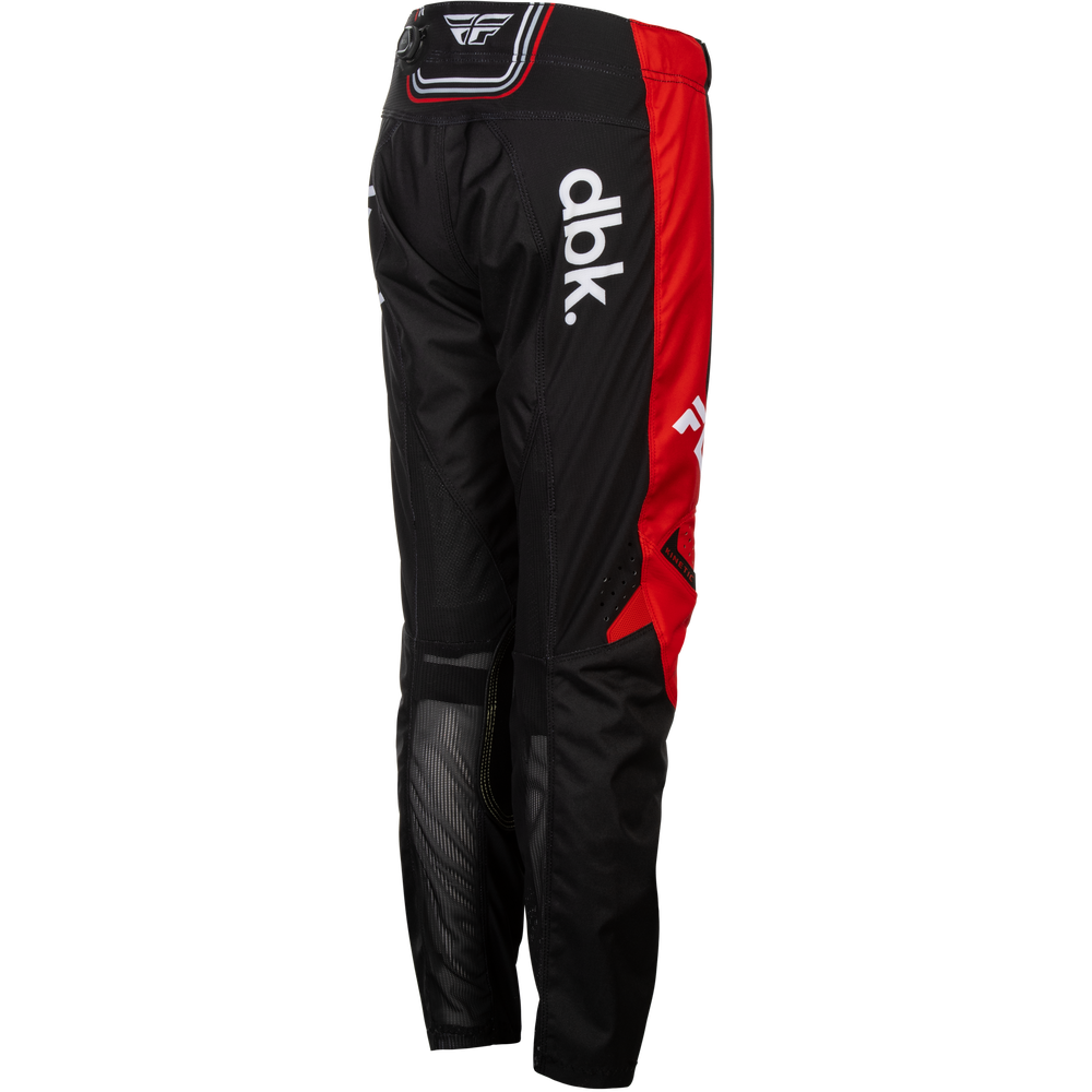 Black and red motocross pants with white 'dkk' branding on the side, shown from the back on a white background.