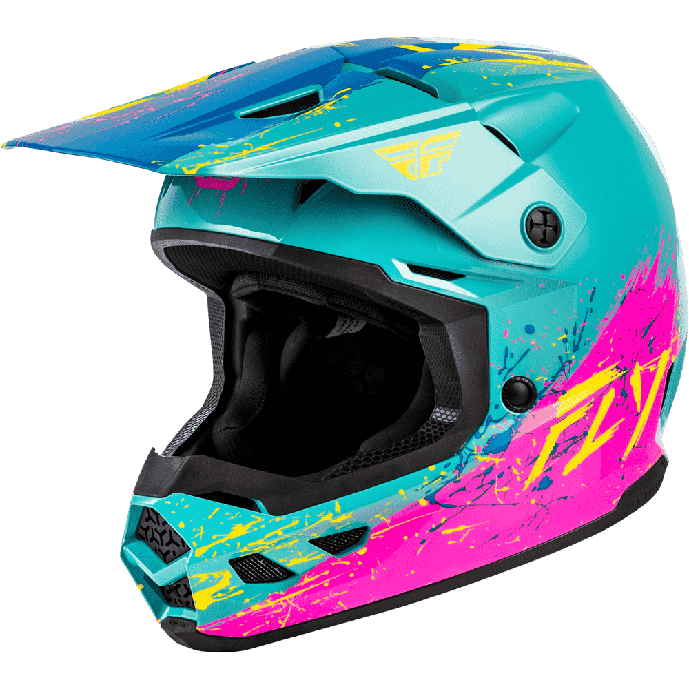 A full-face motocross helmet in a vibrant turquoise color with bright pink, yellow, and neon blue paint splatter graphics, featuring the Fly Racing logo on the side and visor.