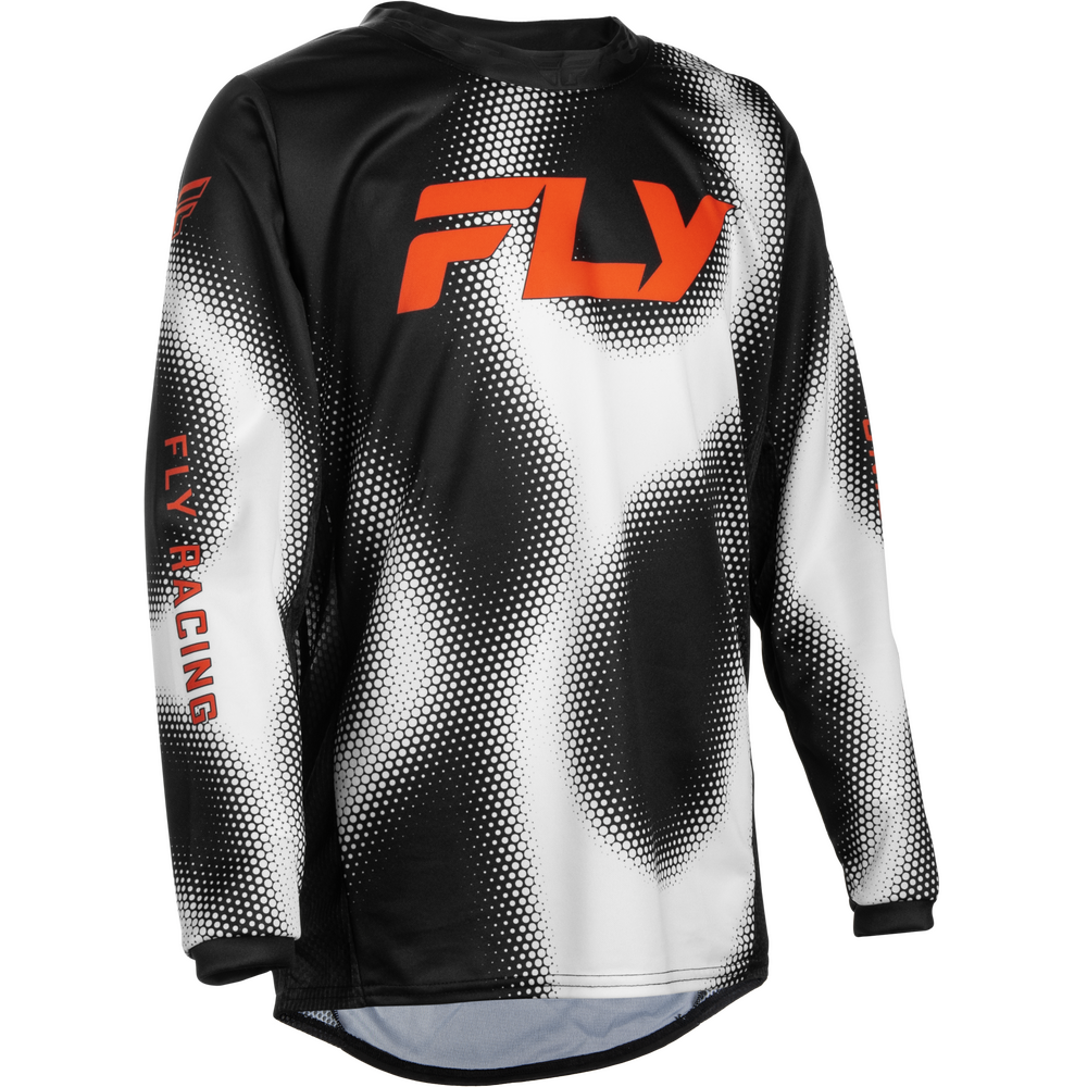A long-sleeve motocross jersey with a black, white, and gray halftone pattern, featuring a prominent orange 'FLY' logo on the chest and 'FLY RACING' printed vertically on the right sleeve.