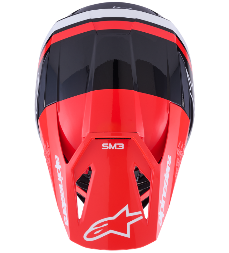Red and black motorcycle helmet with 'Alpinestars' branding on a white background