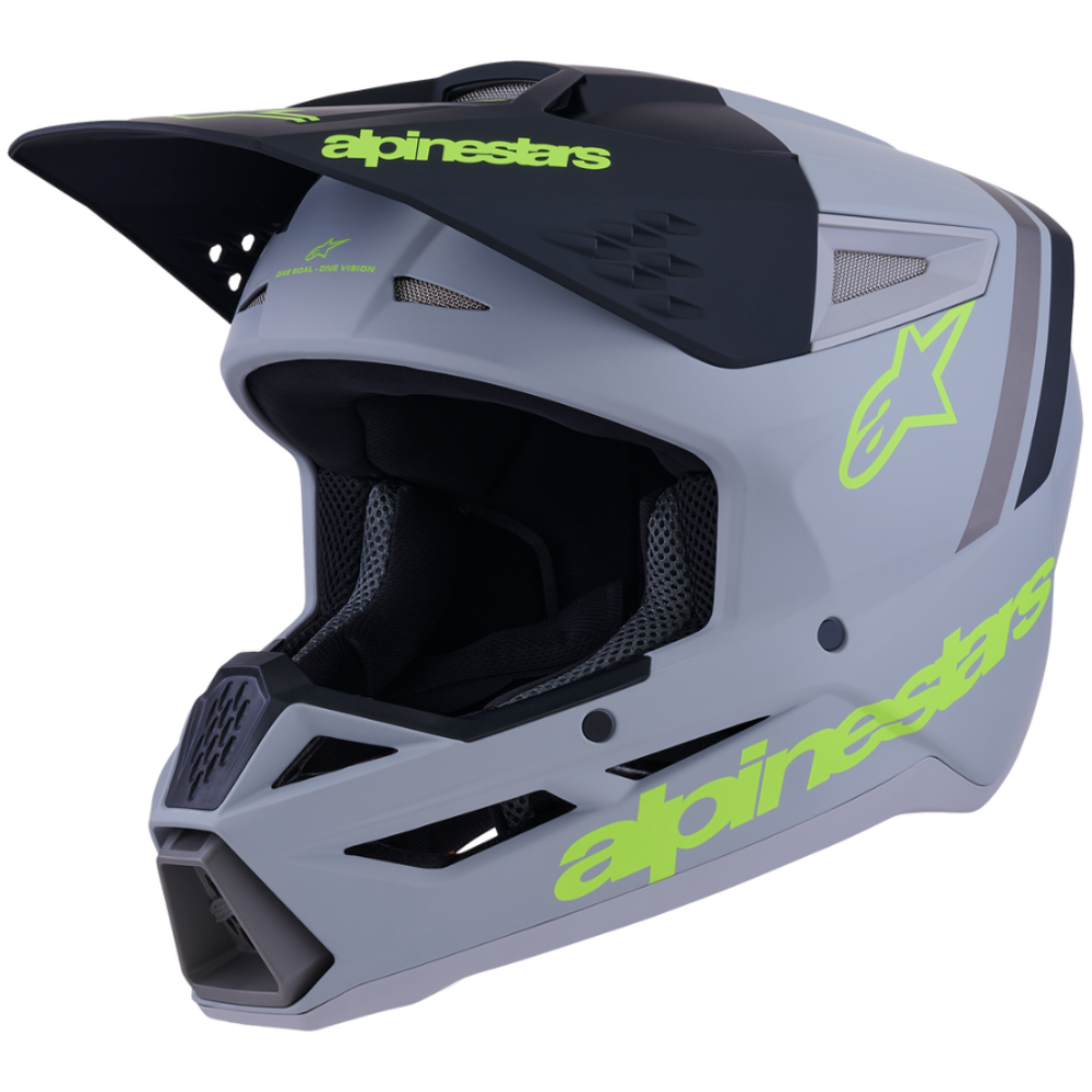 Gray motocross helmet with green 'alpinestars' branding on a white background