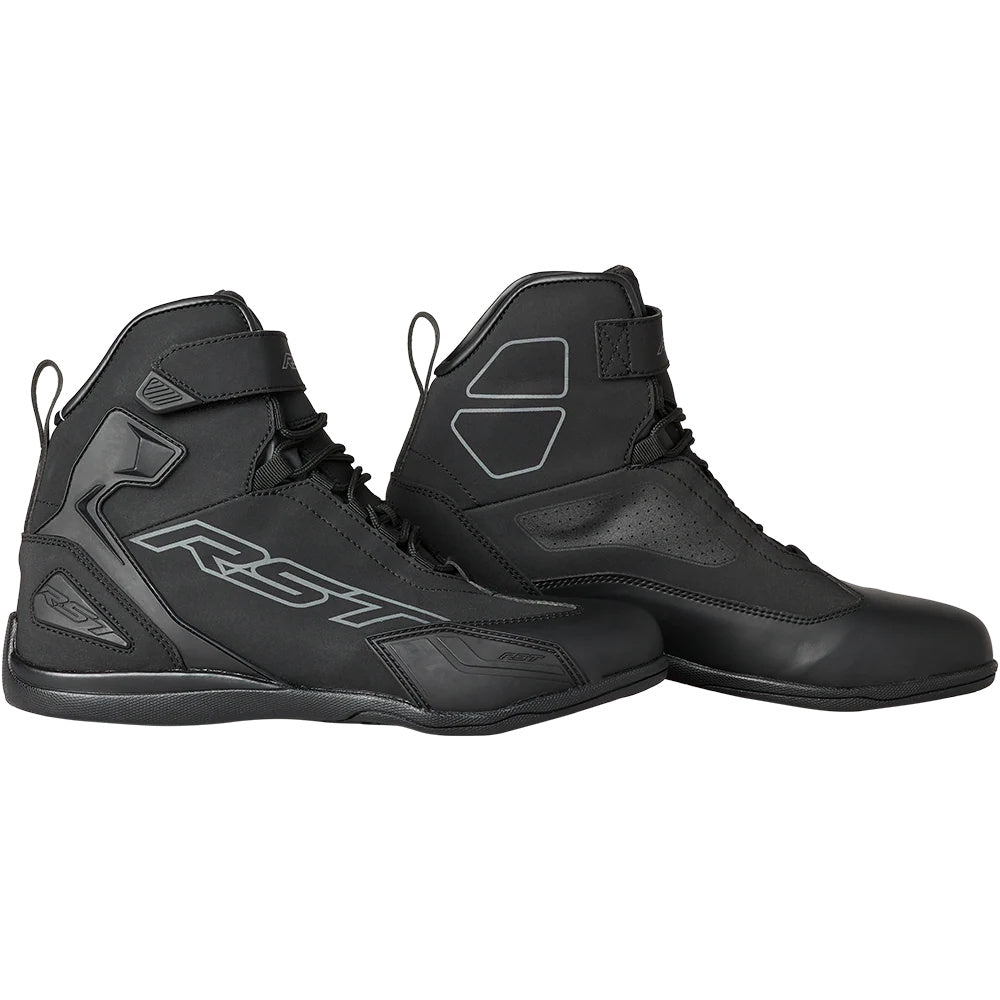 Pair of black high-top shoes with RST branding on a white background