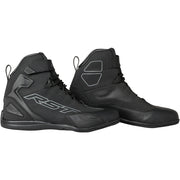 Pair of black high-top shoes with RST branding on a white background
