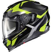 A full-face motorcycle helmet in glossy black with bright neon yellow-green graphic accents and a clear visor, shown on a plain white background. The side of the helmet reads 'SCORPION EXO'.