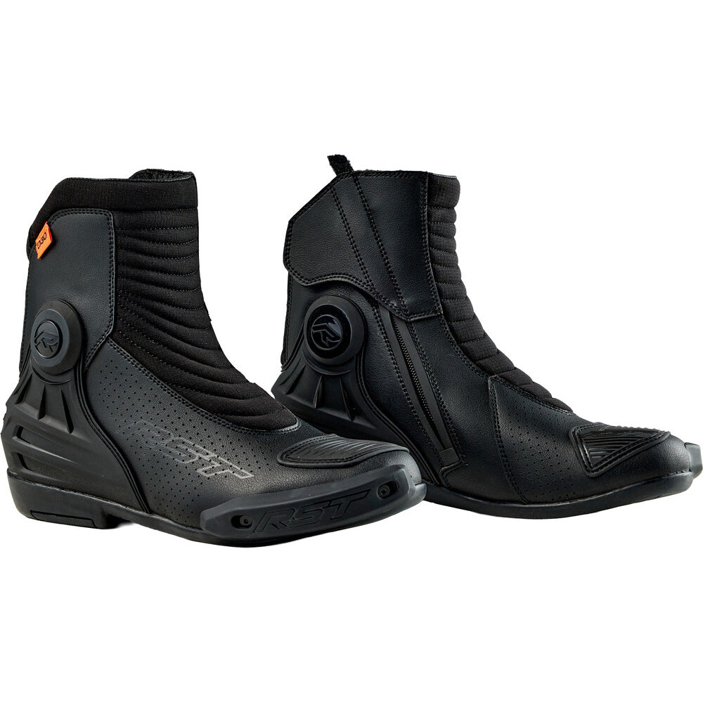 Pair of black motorcycle boots on a white background