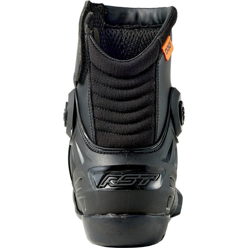 Black motorcycle boot with RST branding on a white background