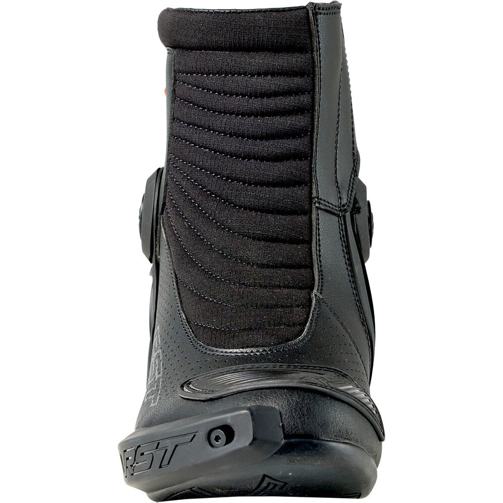 Black motorcycle boot with visible branding on a white background