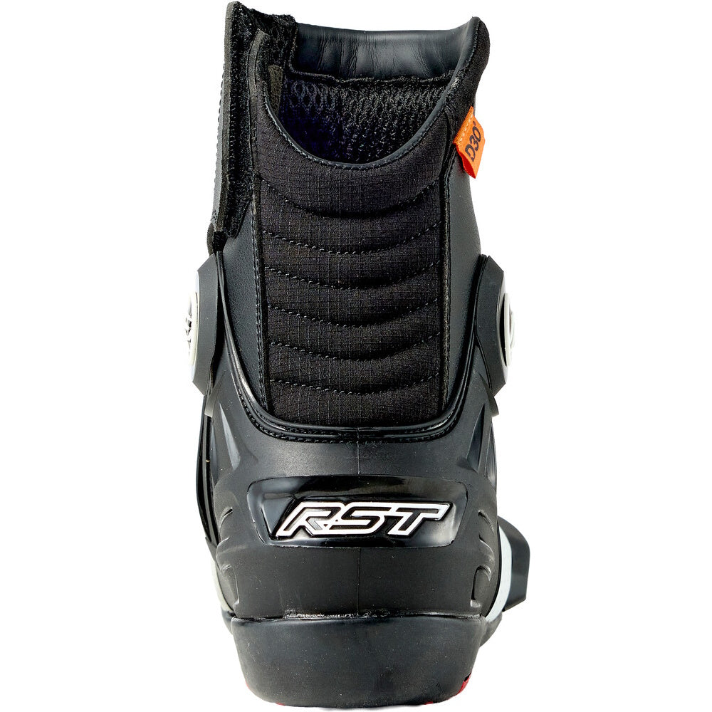 Black motorcycle boot with RST branding on a white background
